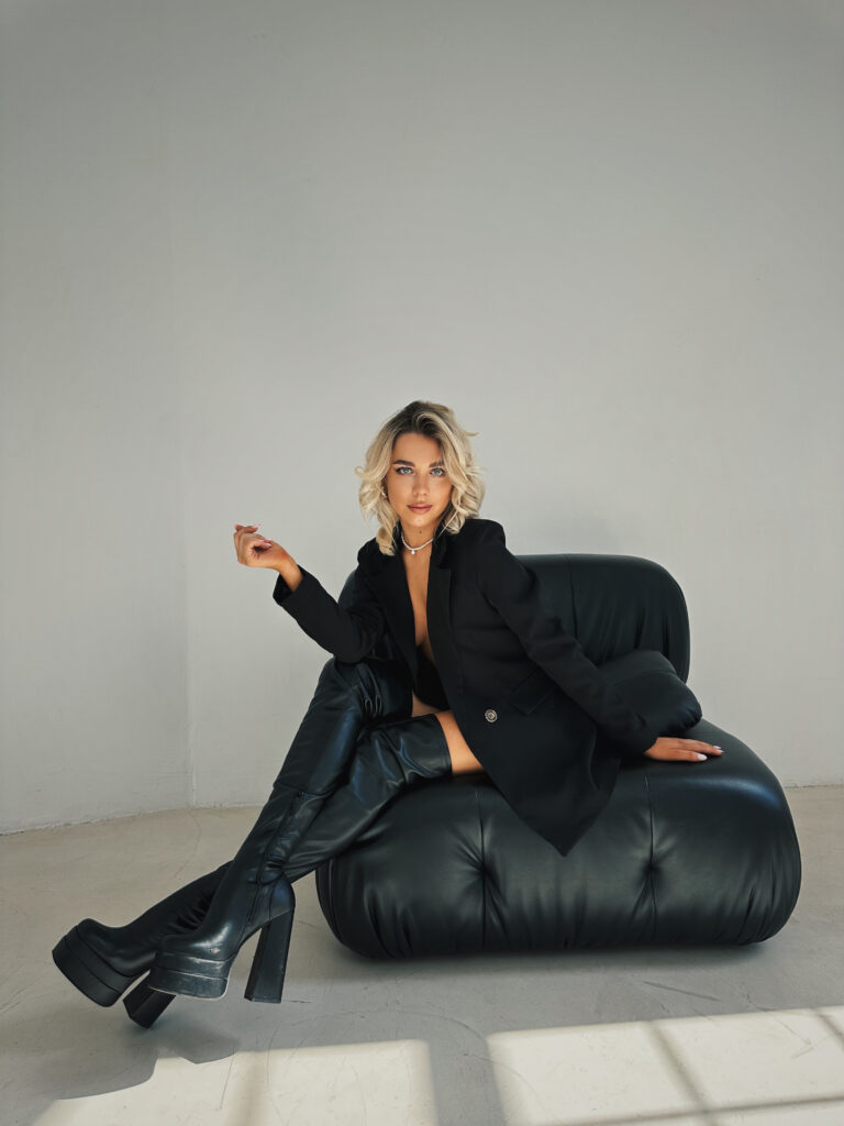 CEO of UK web design agency, blonde woman in black suit, professional leadership portrait representing Artite Webdesign’s expertise in website design services