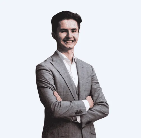 Marketing specialist at UK web design agency, man with brown hair in grey suit, managing digital strategy and promoting website design services